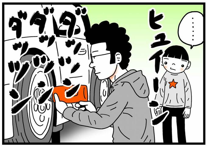 タイヤ交換をする男性