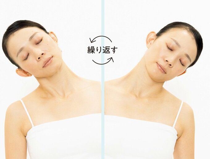 頭を左右に揺らす女性