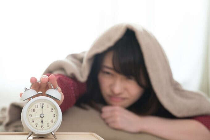 起きれない女性