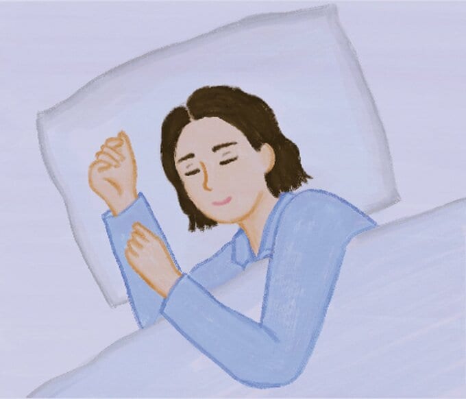 ベッドで眠る女性のイラスト