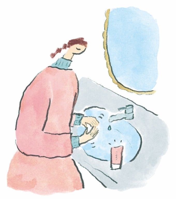 ハンドクリームを塗るイラスト