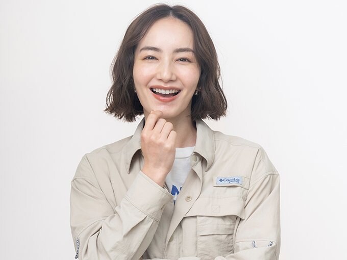 作業着を着た辻元さん