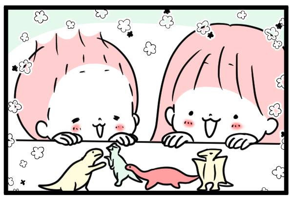 恐竜フィギュアと子ども