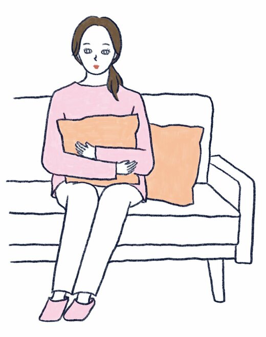 ソファに座る人
