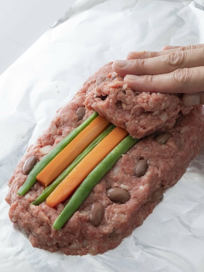 肉ダネを重ねる