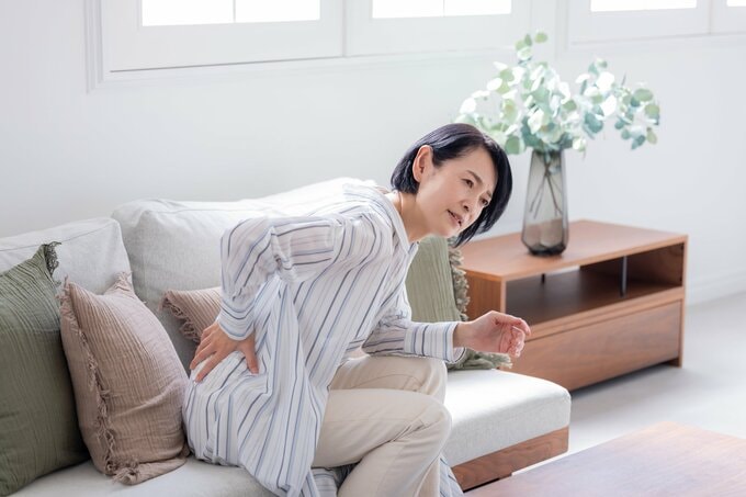 坐骨神経痛に苦しむ50代女性