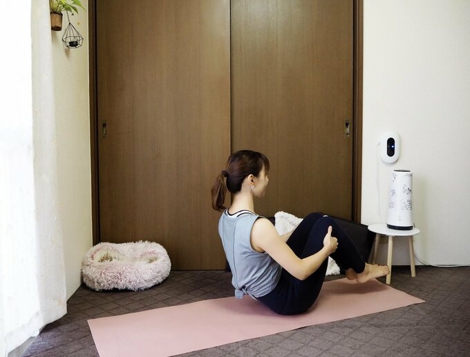 反動を使って上体を起こす