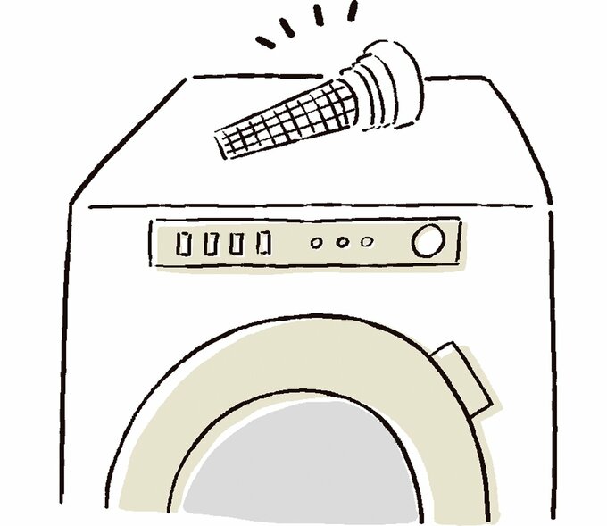 洗濯機の上に排水フィルターを置いているイラスト