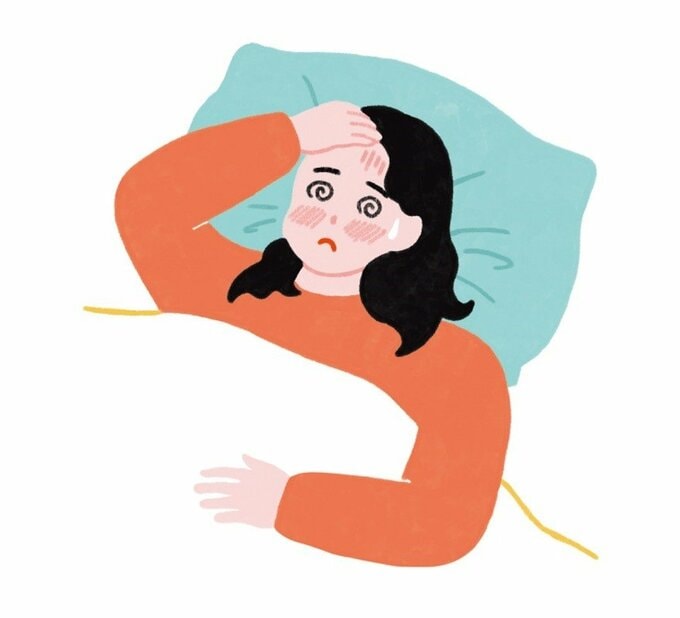 熱で寝込んでいる女性のイラスト