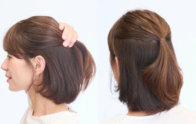髪をまとめる女性