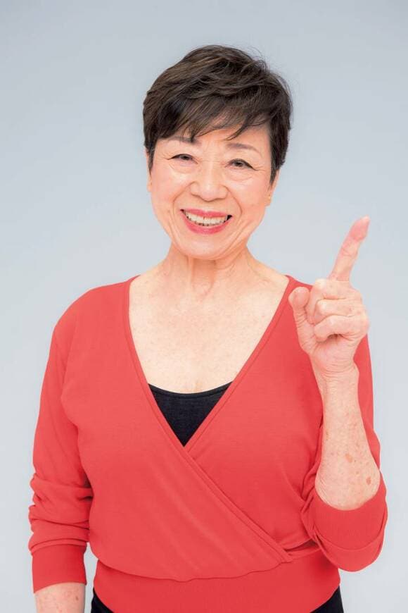女性指差し
