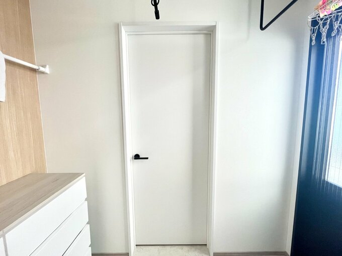 ファミリークローゼットとランドリールームを繋ぐ扉