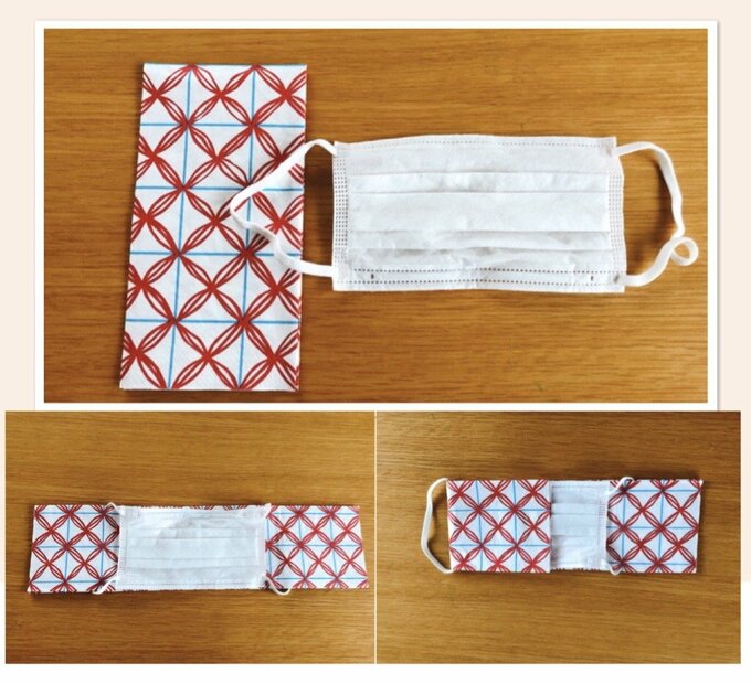 マスクと赤い柄のマスクカバー