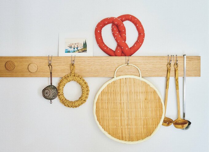 壁にかけた調理器具