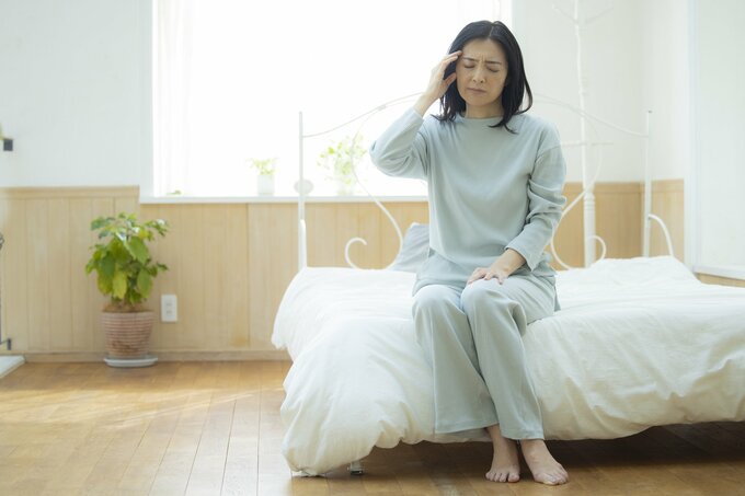 ベッドにいる女性