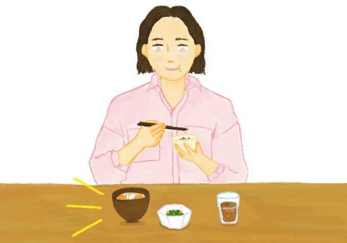 食事をする女性のイラスト