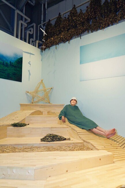 サウナポンチョ姿の田中さん