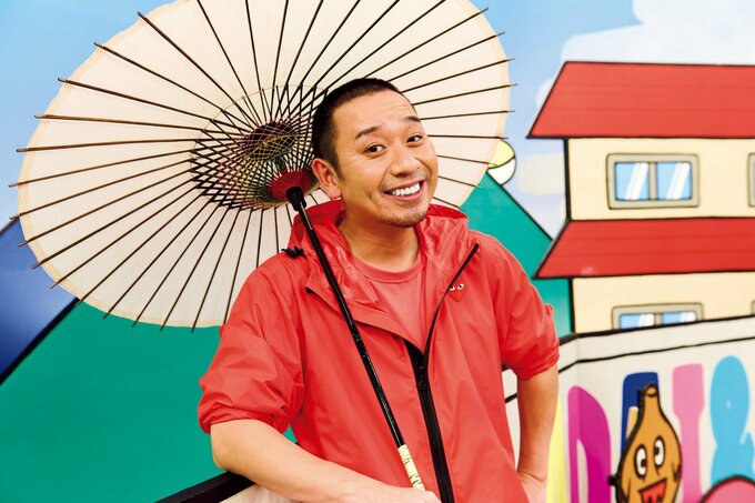 和傘をさす大悟さん