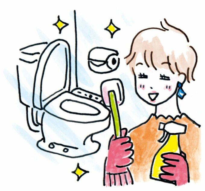 トイレ掃除をする女性