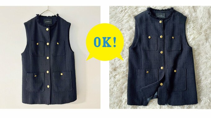 おしゃれな布のうえに置いてある、フォーマルな雰囲気の黒いベスト