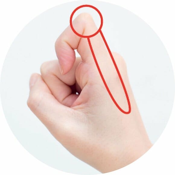 折り曲げた人差し指