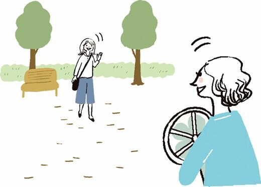 公園で待ち合わせする女性