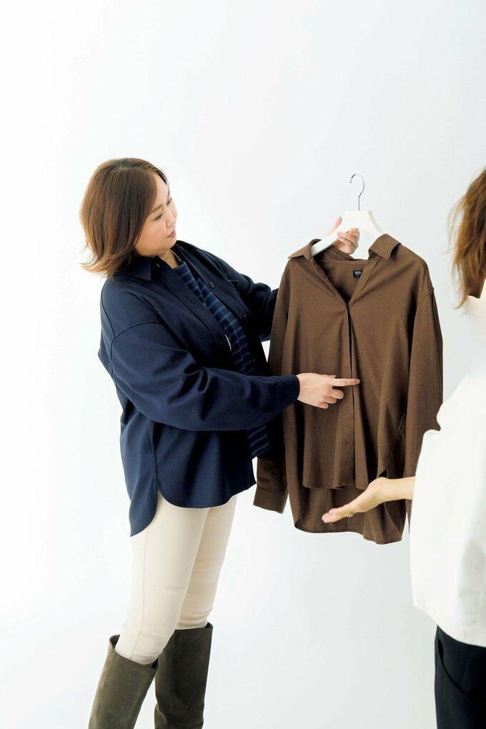 ロングブーツはいた女性