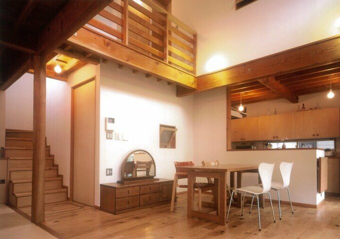 キッチンの前面を壁の素材と同じに仕上げた空間