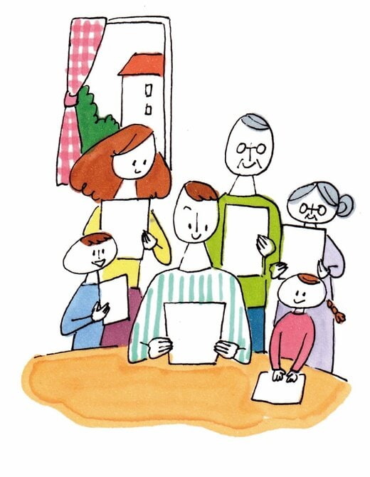 防災メモをチェックする家族