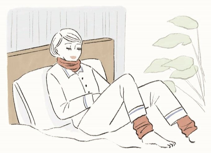 タオルを首に巻く女性のイラスト