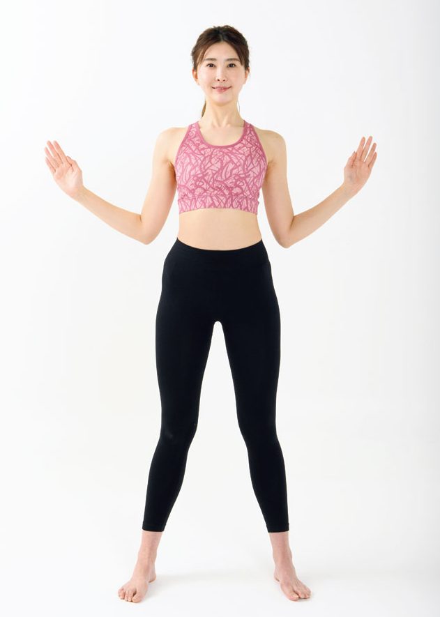 両手揚げてひじを腰近くに