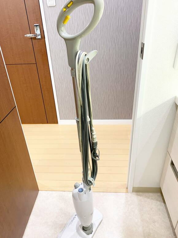掃除機にコードをまく