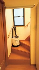 掃除機と付属品を袋ごと持ち運び