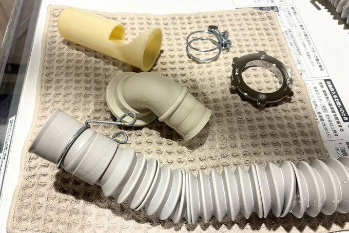 洗濯機の排水口パーツ