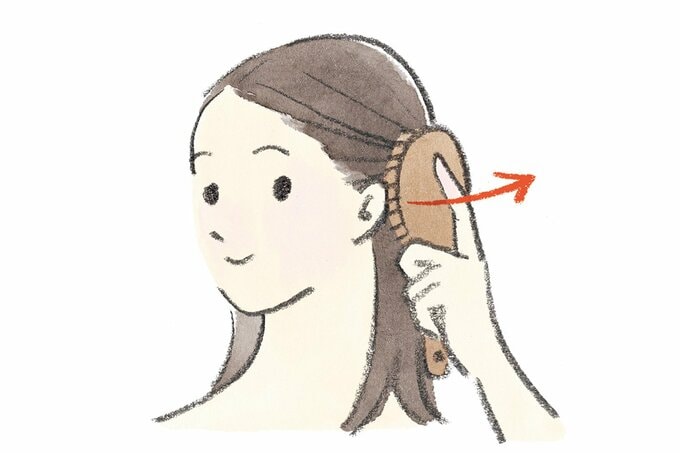 ブラシで頭皮マッサージする女性のイラスト