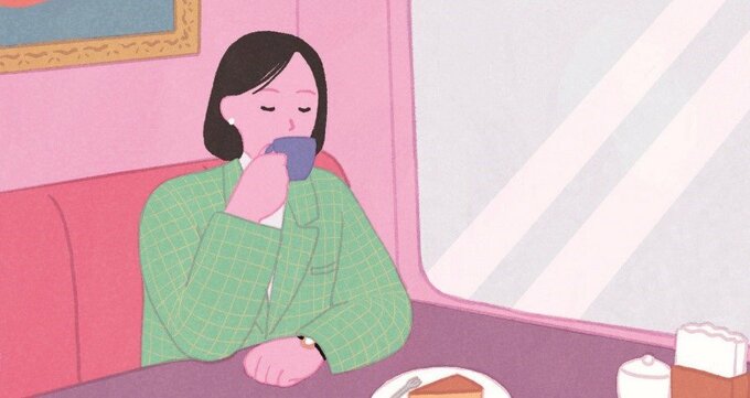 ゆっくりとお茶を飲む女性