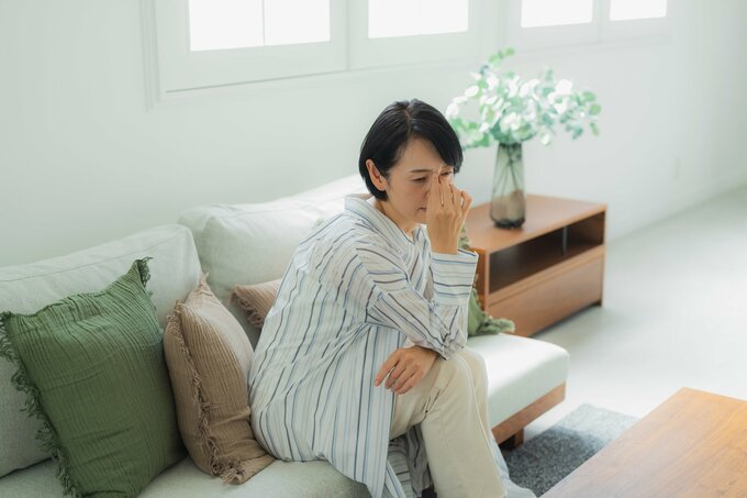 不調を感じる女性