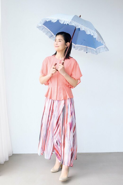 日傘をさす石田さん