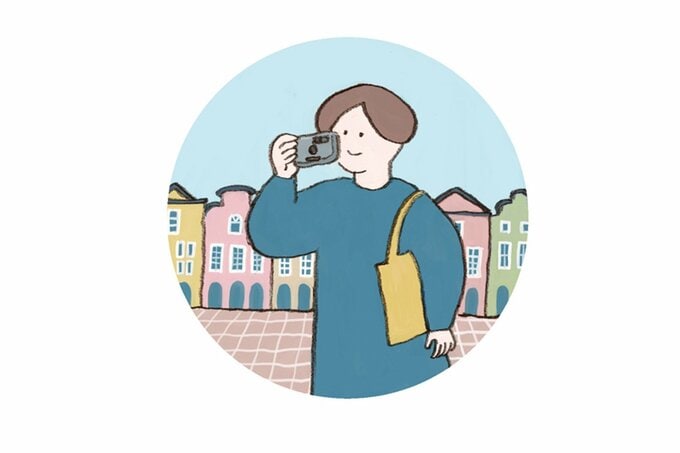 フィルムカメラで撮影しているイラスト