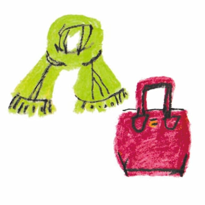 グリーンのマフラーとワインレッドのハンドバッグ