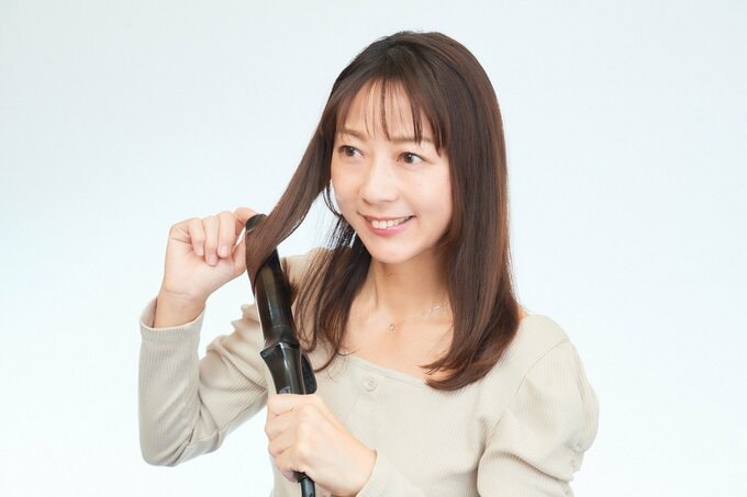 アイロンと女性