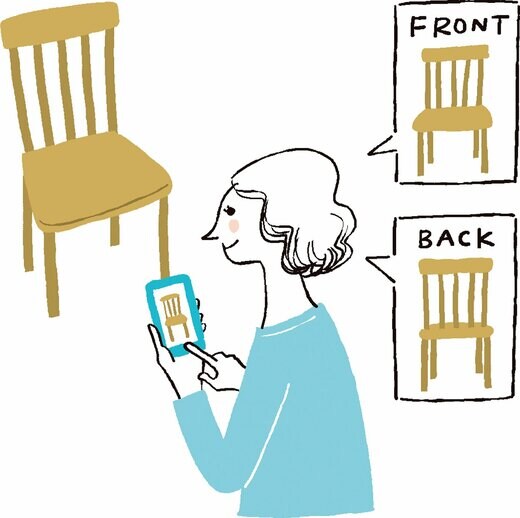 イスの写真を撮る女性のイラスト