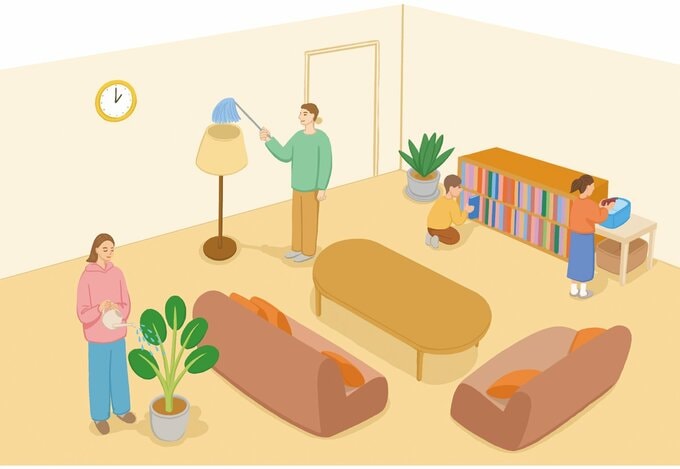 家族でリビングを掃除している様子