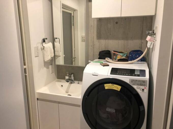 洗濯機の上に色々なモノ