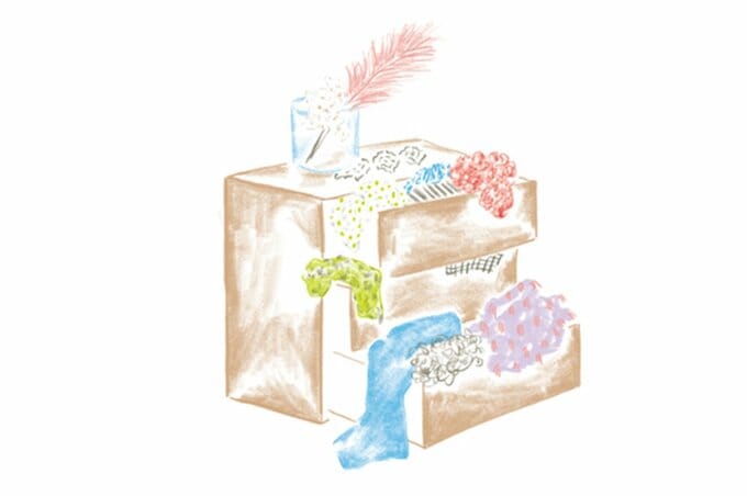 タンスから服があふれているイラスト