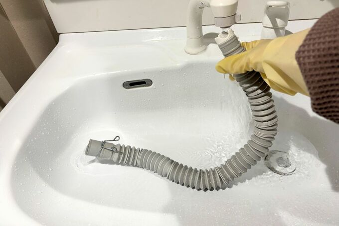 洗濯機　排水口ホース洗浄