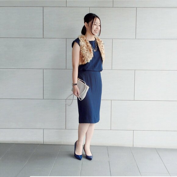 羽織るだけで華やかなヒョウ柄ファーベスト