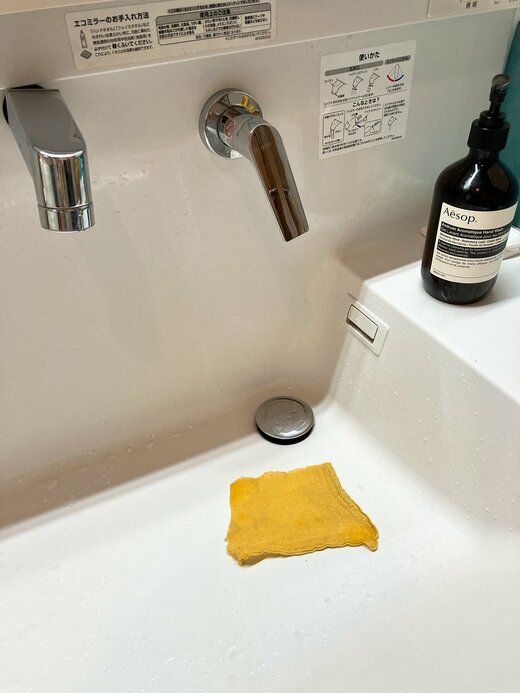 写真：排水溝汚れ取り