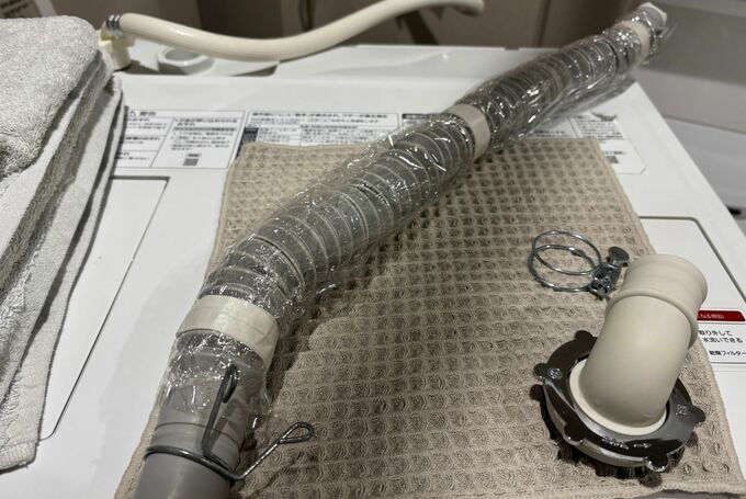 洗濯機　排水口パーツ
