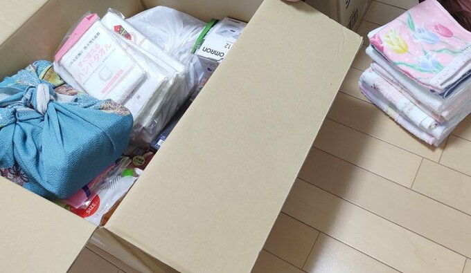 ダンボールにつめる